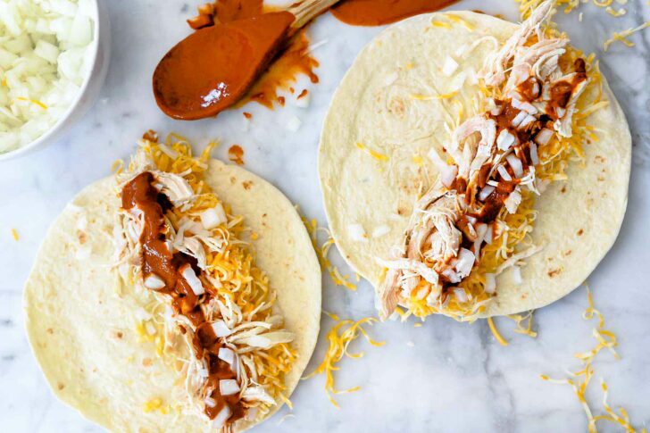 Easy Chicken Mole Enchiladas | foodiecrush.com #enchiladas #easy #chicken #mole #recipes