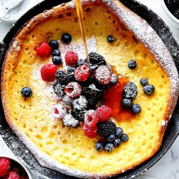 Dutch Baby with Syrup and Berries foodiecrush.com