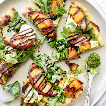 Grilled Flatbread with Peaches and Arugula Pesto foodiecrush.com