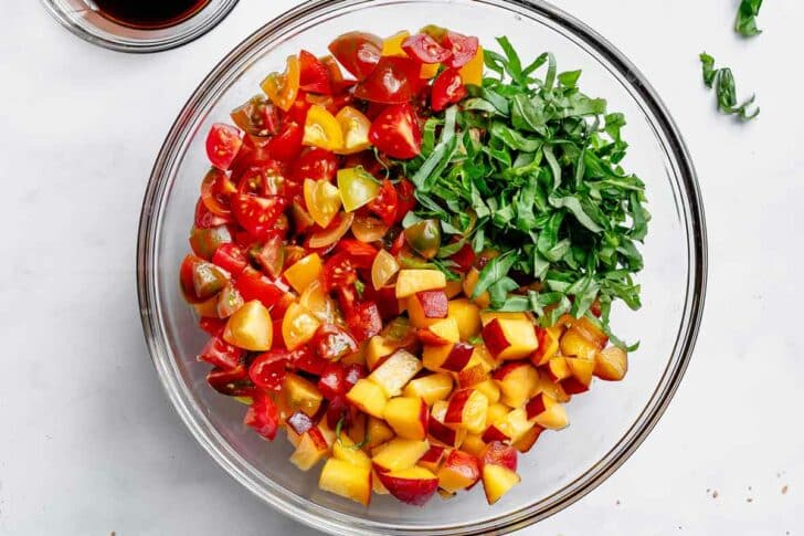 What's in Tomato and Peach Bruschetta in bowl foodiecrush.com