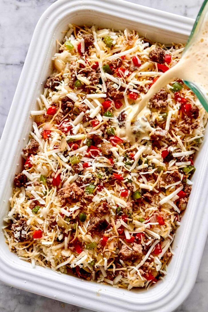 Sausage Breakfast Casserole with egg in baking dish foodiecrush.com