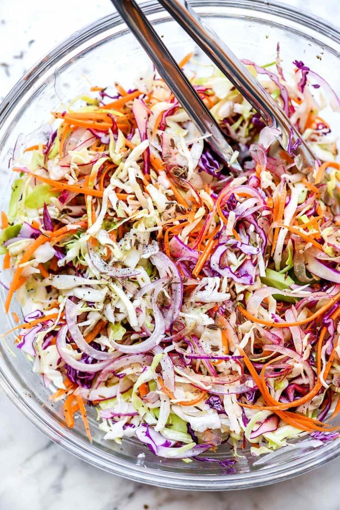 Tangy Vinegar Coleslaw (No Mayo) foodiecrush.com #coleslaw #vinegar #recipes #easy #healthy 